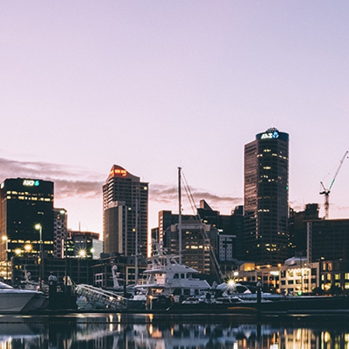 New Zealand city with sunset background